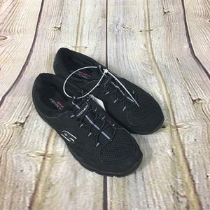 Black Skechers sneakers